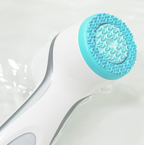 ageloc-lumispa-cleansing-device-and-silicone-head-in-water-lifestyle-image